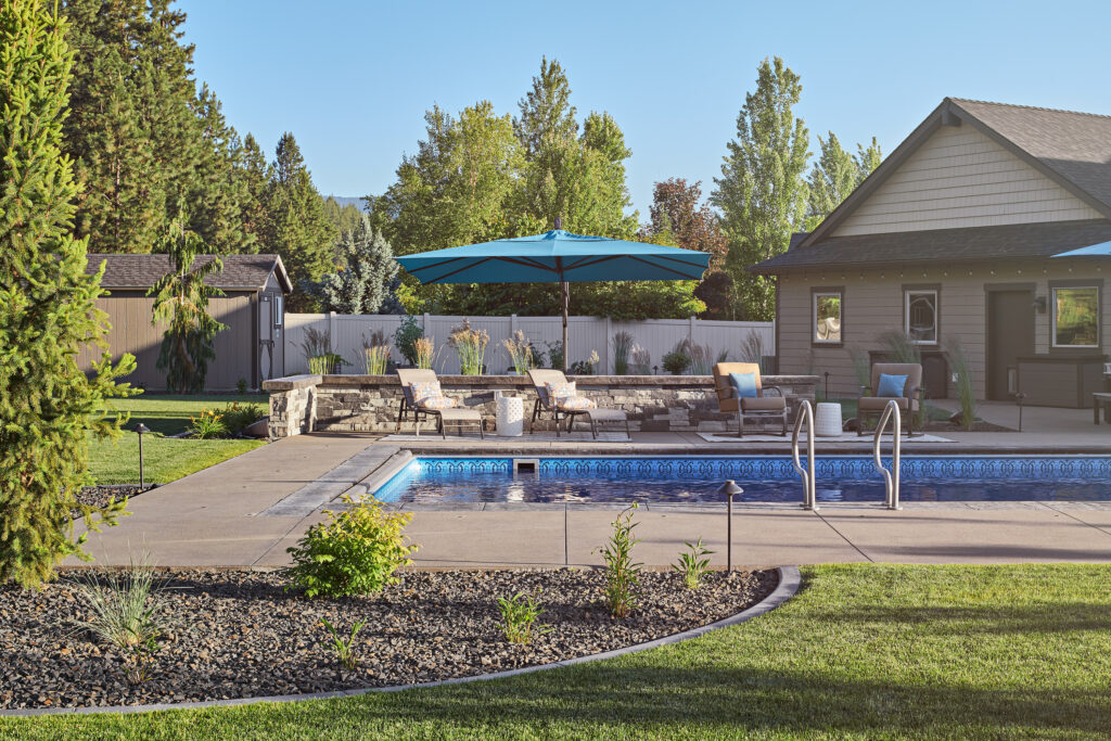 Liberty Lake Pool — Afternoon pool and sitting area with flare