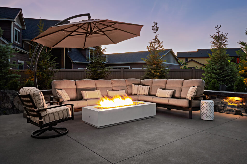 Liberty Lake Pool — Twilight backayrd fireplace