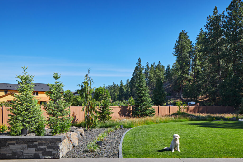 Liberty Lake Pool — Grass and rock garden divide