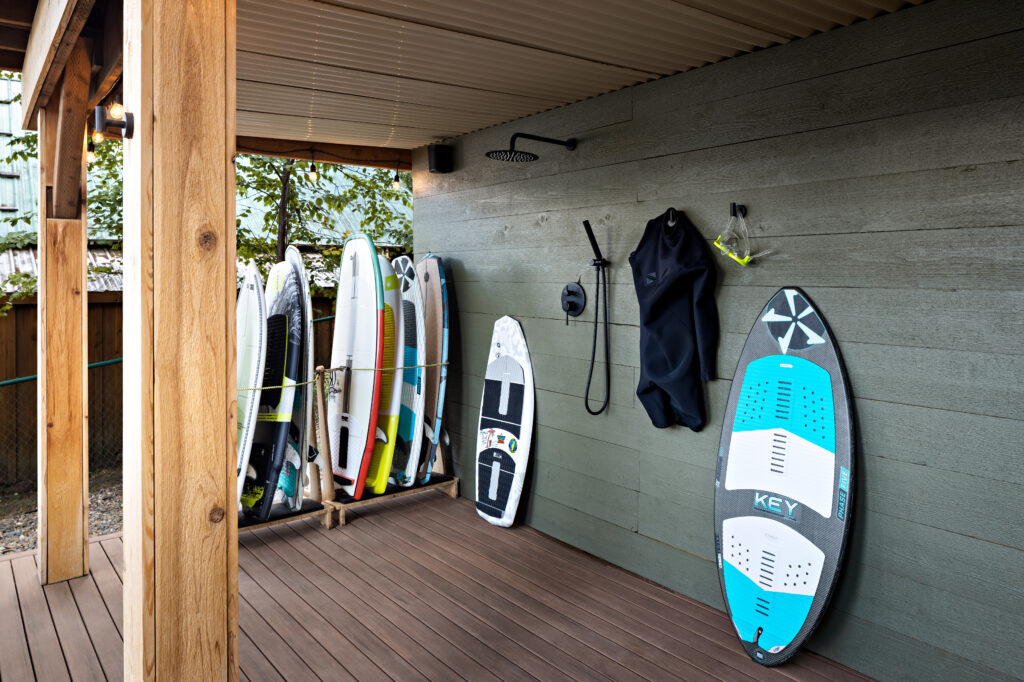 SUN + SAND + WAKE — Roslund cabin shower under deck